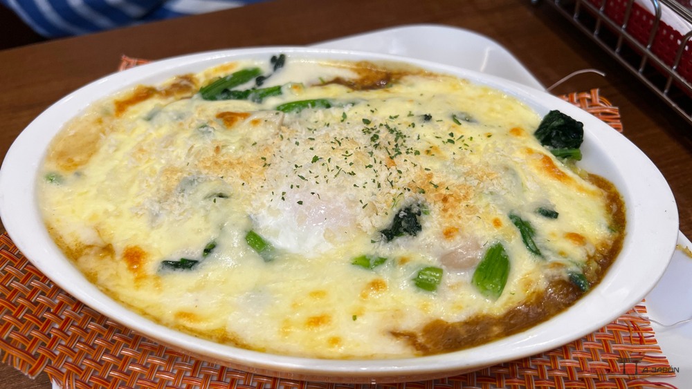 Doria de arroz gratinado con espinacas y huevo